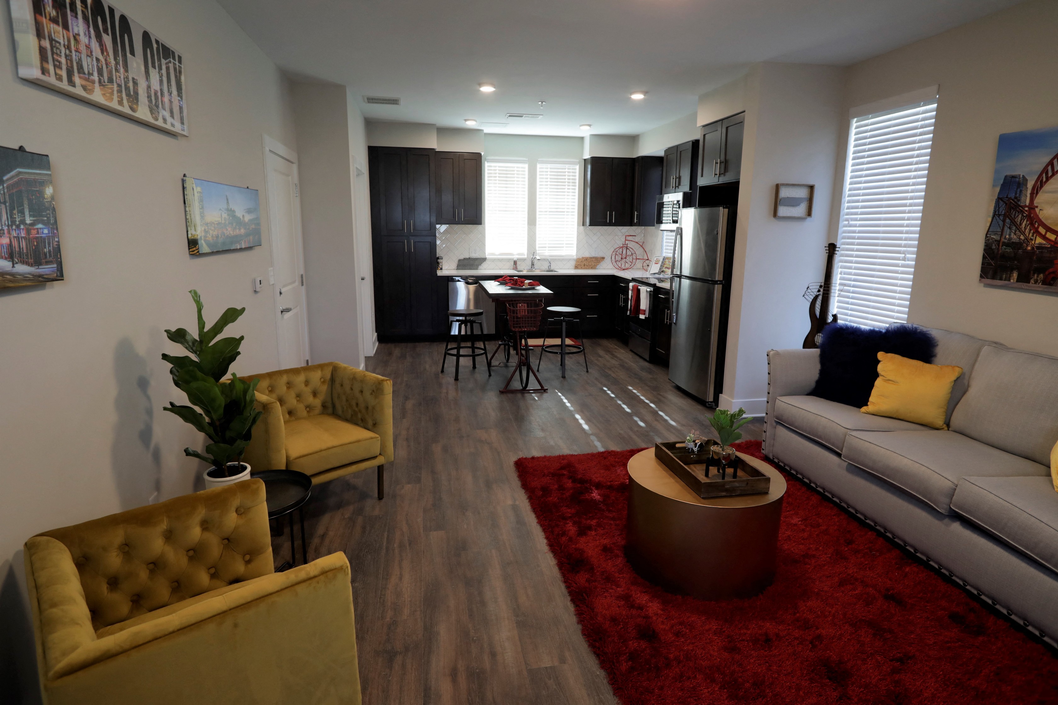 a living room and kitchen in an apartment