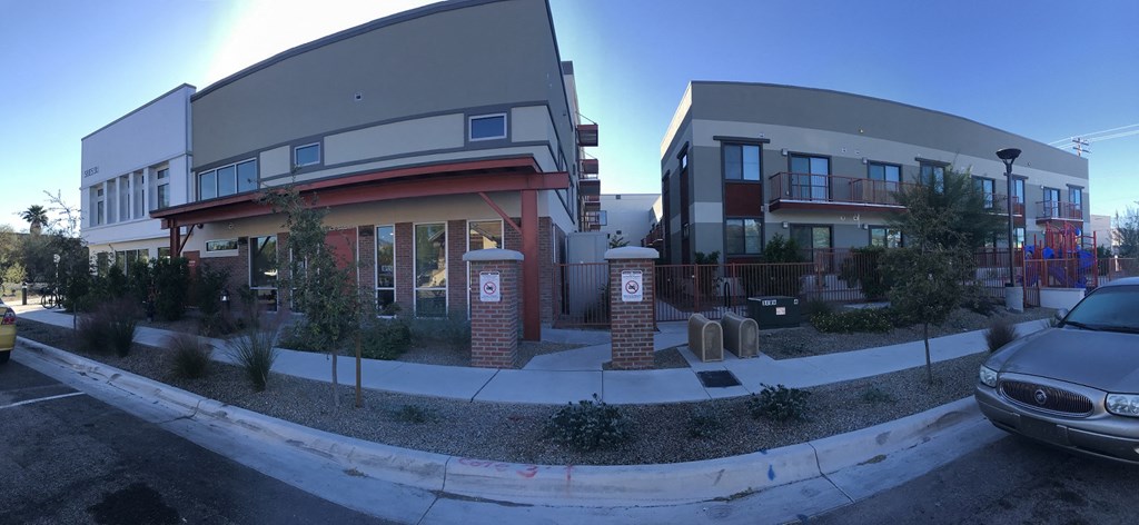 a building with a car parked in front of it