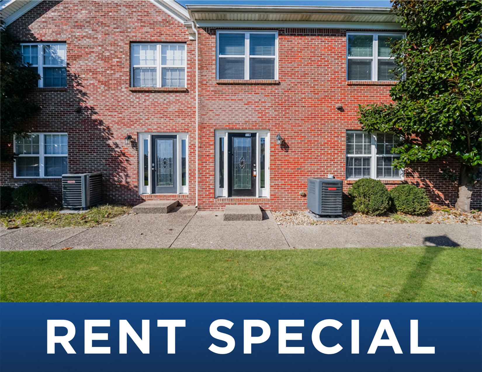 a red brick house with the words rent special on it
