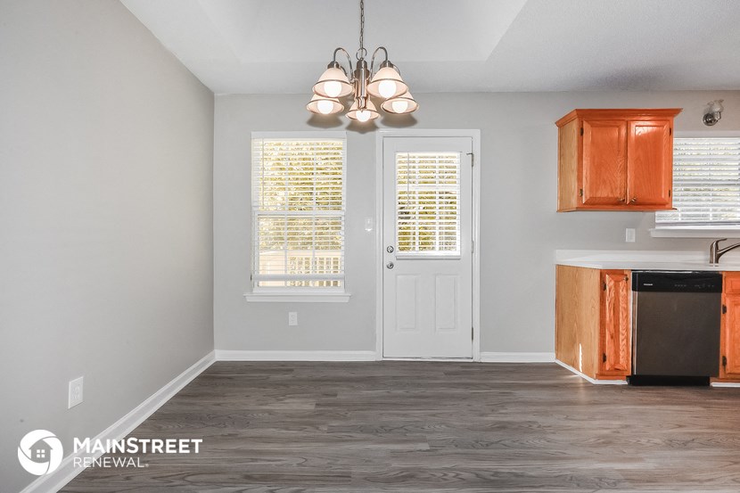 the kitchen and dining room of a 560 sq ft home
