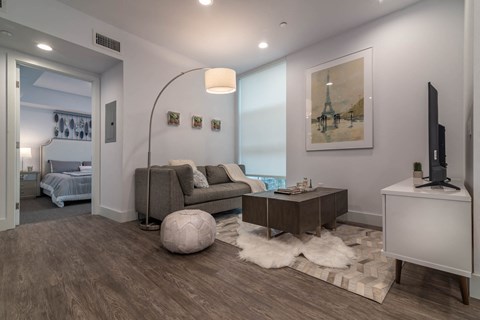 a living room with a couch and a tv