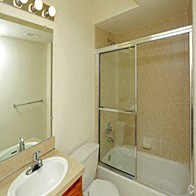 a bathroom with a sink toilet and a shower