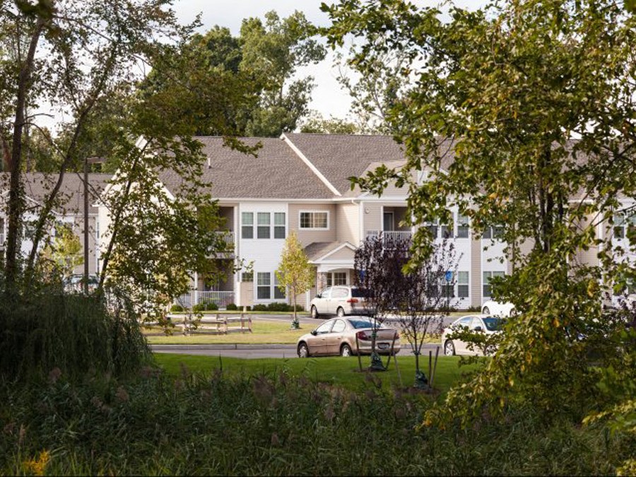 a large building with a car parked in front of it