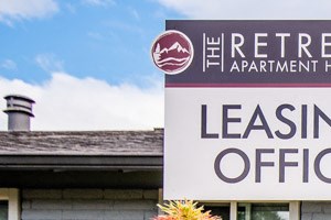 Sumner Apartments - The Retreat Apartments - Leasing Office Exterior and Community Mascot Sumner Apartments - The Retreat Apartments - Leasing Office Exterior and Community Mascot - Photo Gallery 2