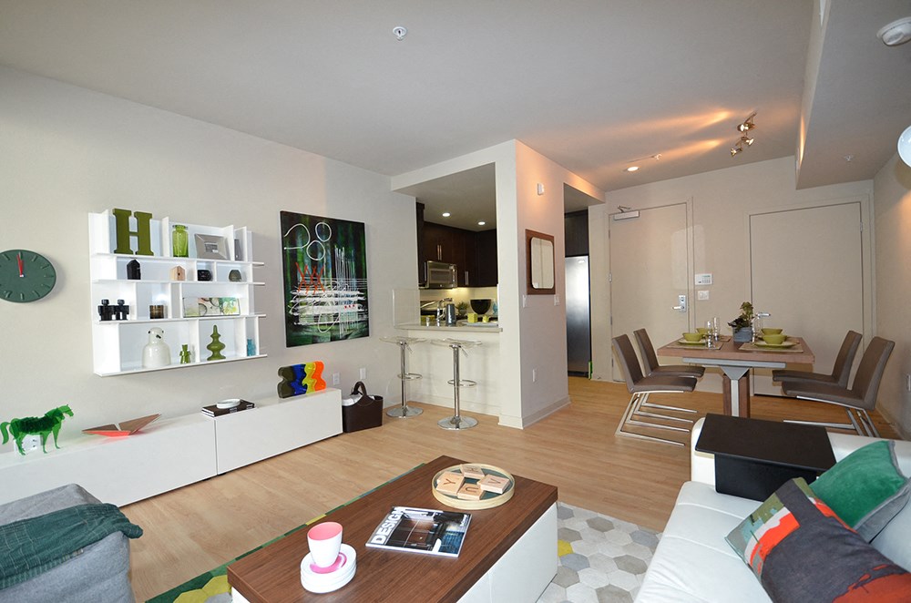 a living room and dining room in an apartment