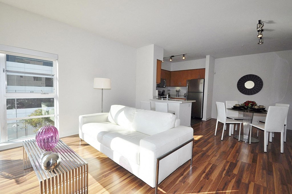 a living room with a couch and a table