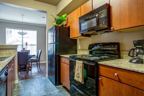 Kitchen at The Ranch at Pinnacle Point Apartments in Rogers, AR