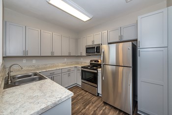 Swift Creek Commons Apartments - Interior kitchen with premium upgraded finishes - Photo Gallery 11