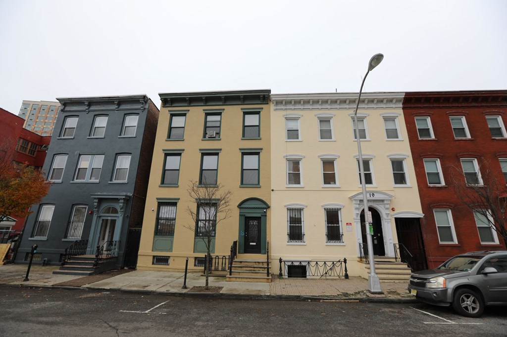 a row of houses on a city street
