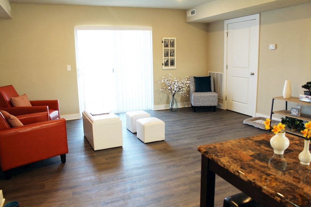 a living room with a couch and a table
