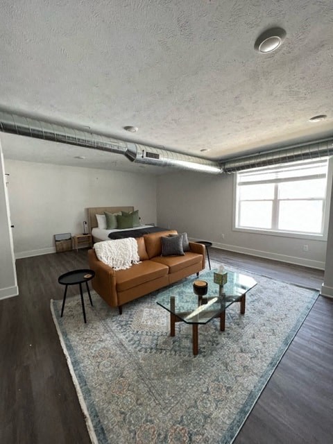 a living room with a couch and a table