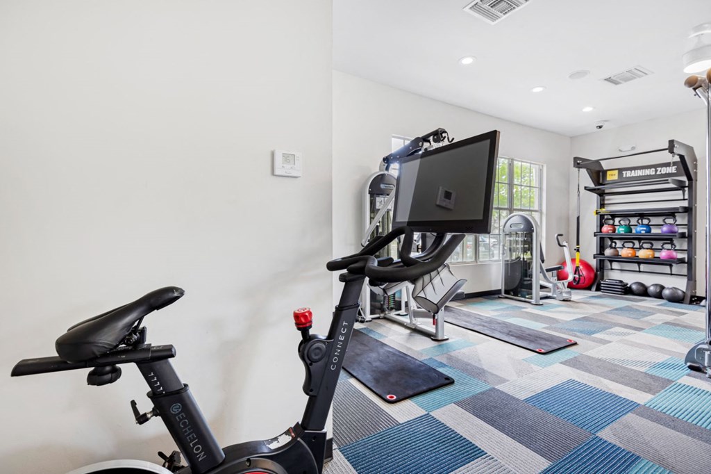 the gym at the monarch luxury apartments