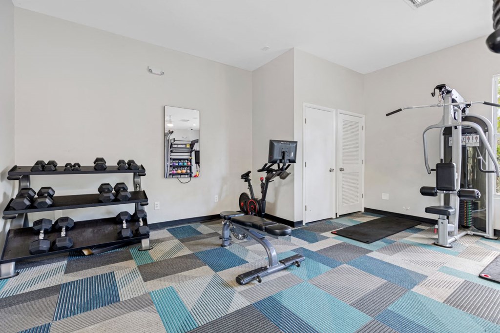 the gym at the flats at big tex apartments
