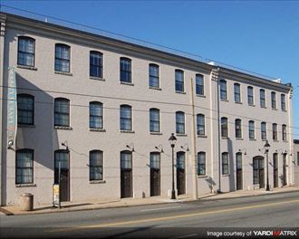 a large white building with a lot of windows