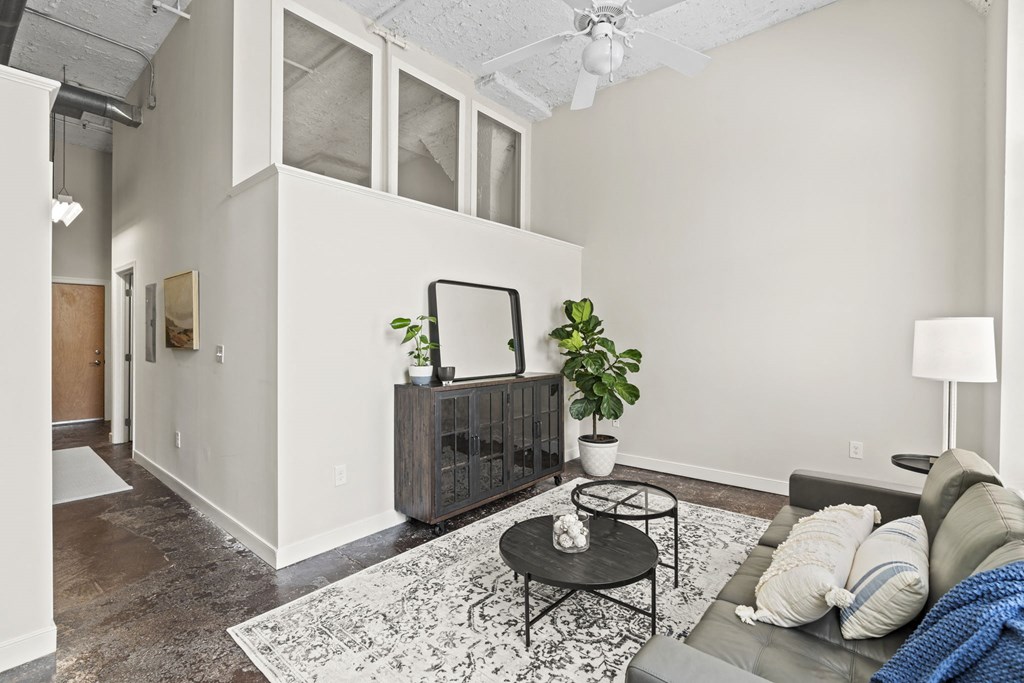 a living room with a couch and a table
