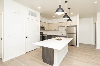 Kitchen with Island  l Santa Rosa CA Apartments - Photo Gallery 24