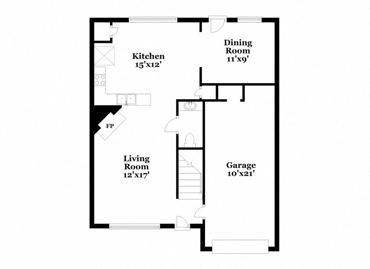 a floor plan of a house with a garage and a kitchen and a living room