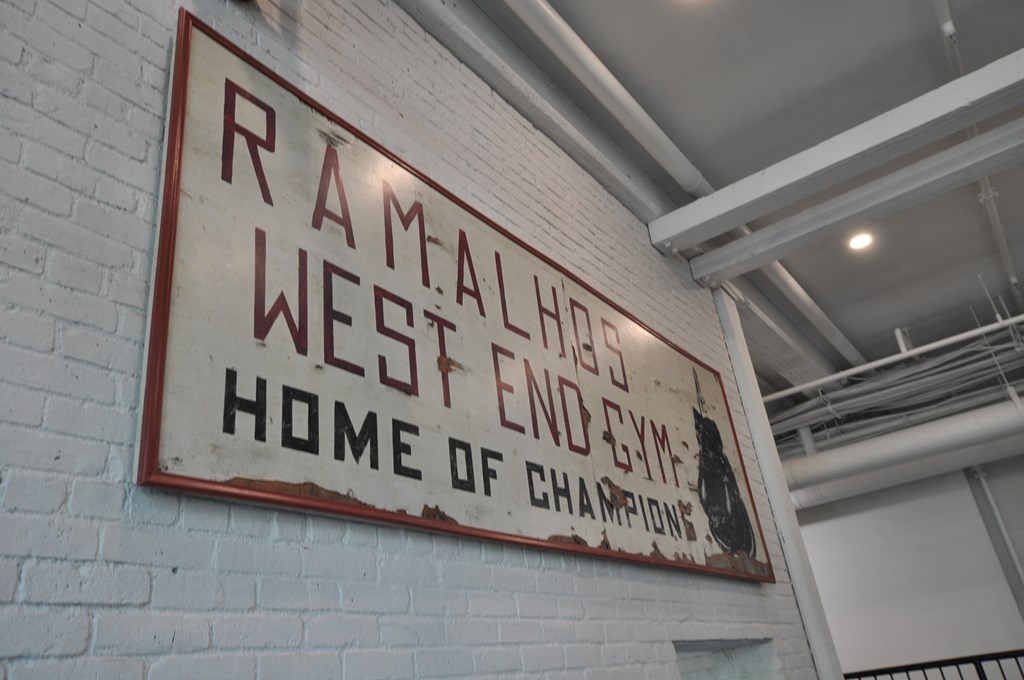 a sign on the wall of a building that says evil