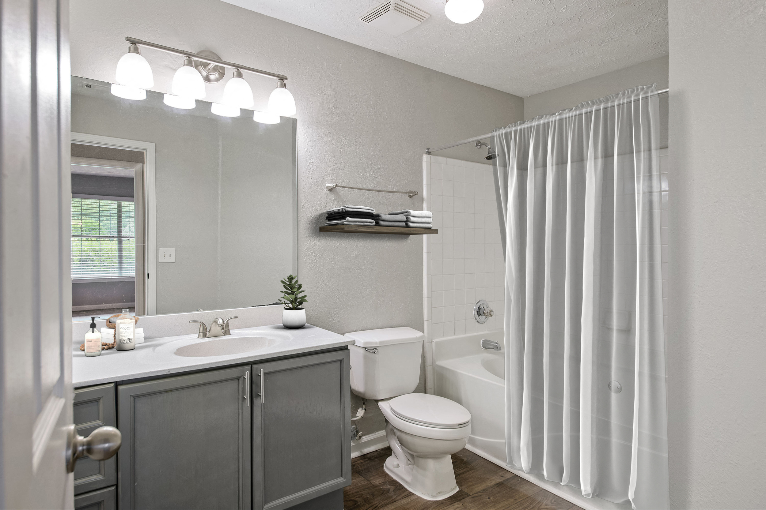 Private bathroom off bedroom at Crestmark Apartments