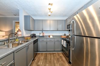 Efficient Appliances In Kitchen, at Crestmark Apartment Homes, Lithia Springs, 30122