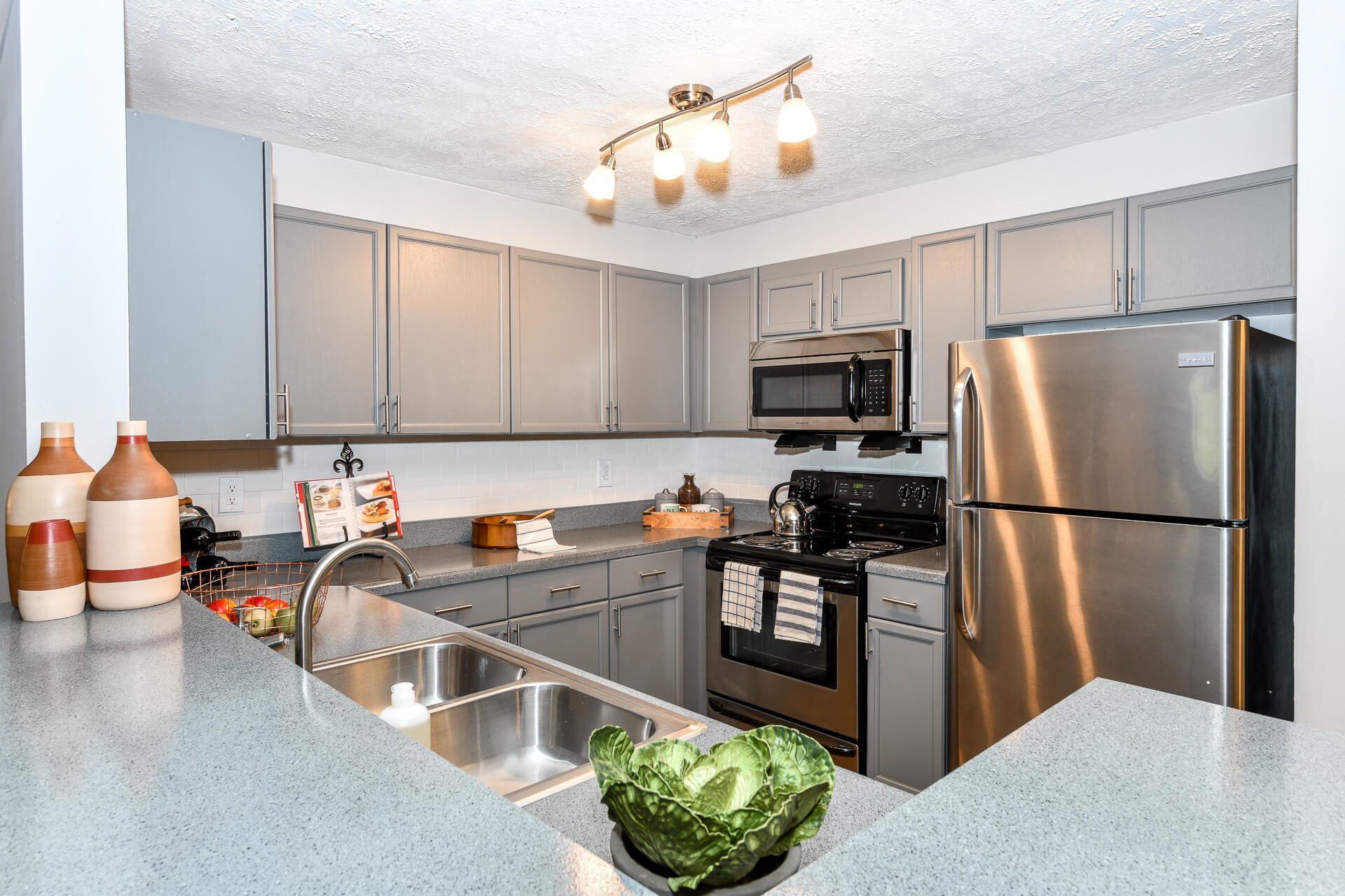 Newly Renovated Interiors Including Stainless Steel Appliances, at Crestmark Apartment Homes, Lithia Springs, GA 30122