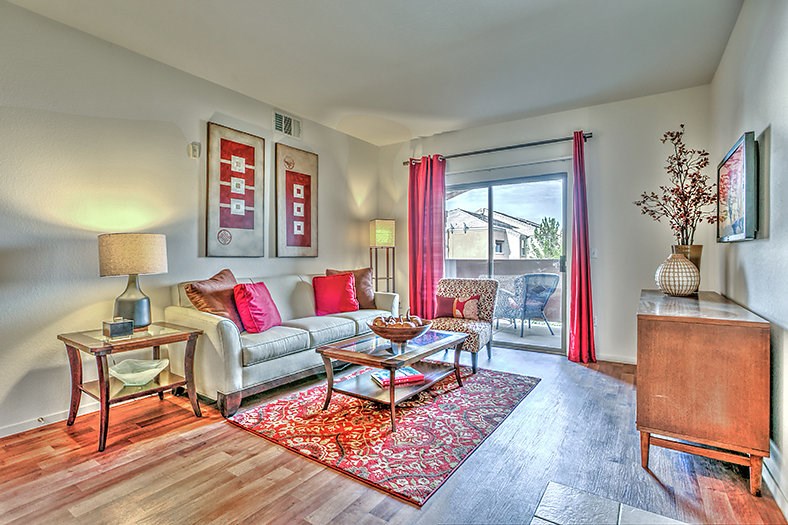 a living room with a couch and a table