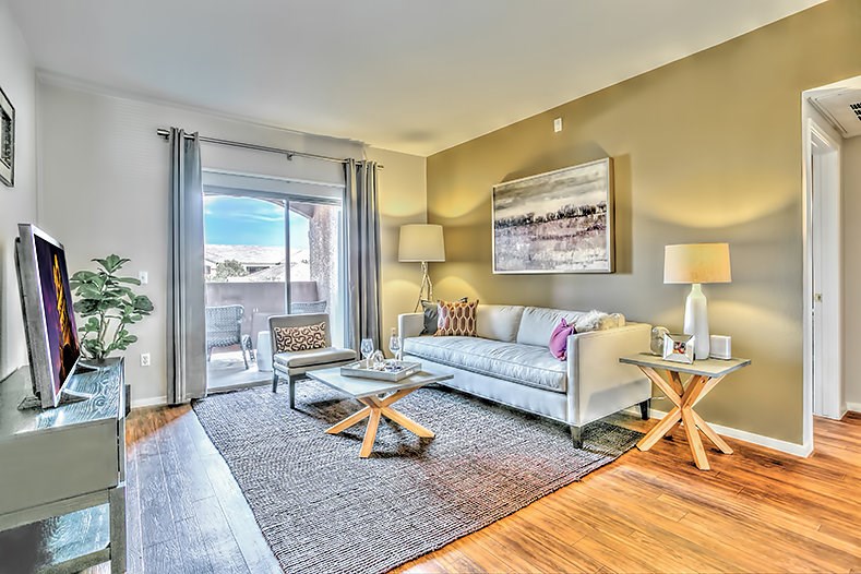 a living room with a couch and a tv