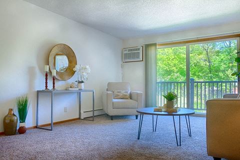 Living Room With Balcony at Grandview Terrace Apartments, Mound, 55404