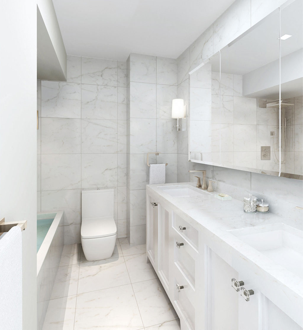 a white bathroom with a toilet and a sink
