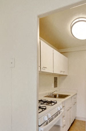 Kitchen with white cabinets at Broadfalls in Falls Church, VA Kitchen with white cabinets at Broadfalls in Falls Church, VA