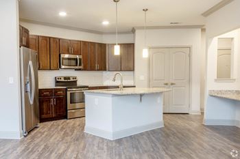 Kitchen with island l Westminister Apts For Rent, CO l Caliber at Hyland Village