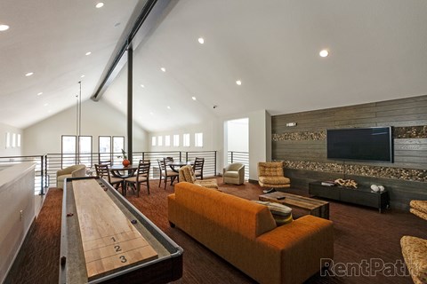 Shuffleboard in the Ranch House Loft l Game Room 