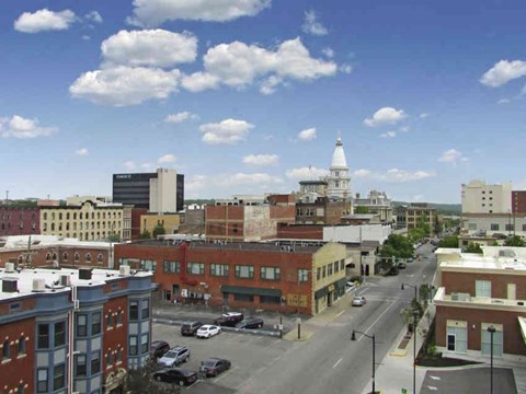 a view of the city from the roof of a building