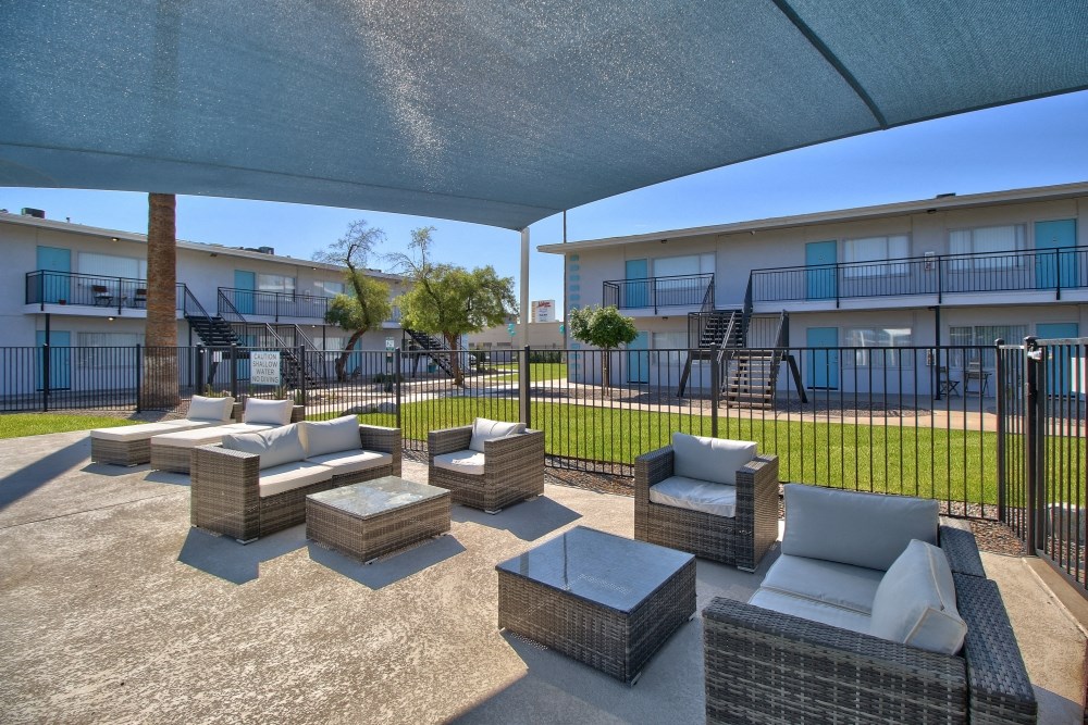 the preserve at ballantyne commons clubhouse patio with couches and tables