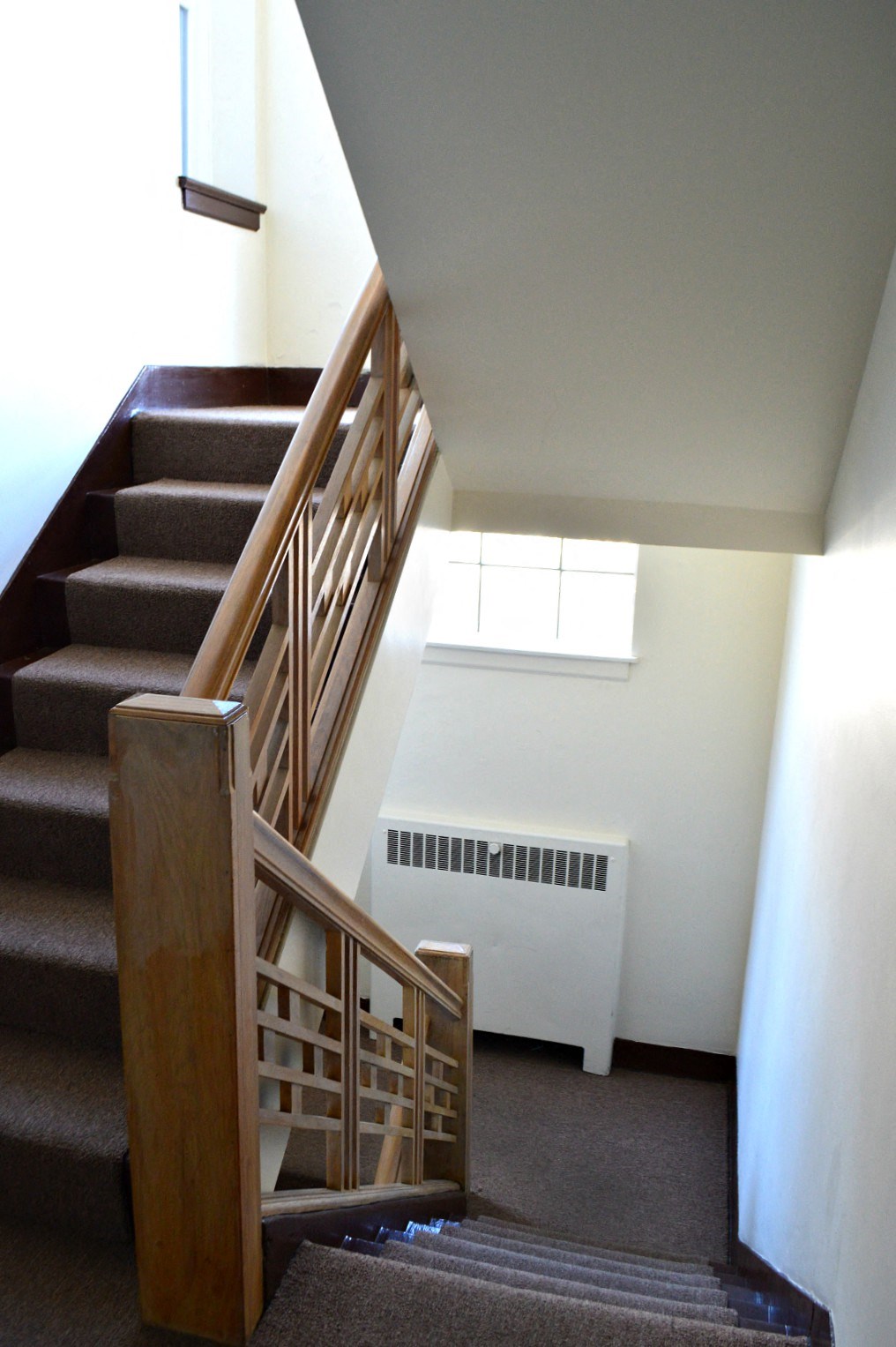 a view of the stairwell from the bottom of the stairs