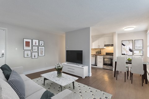 a living room with a couch and a table and a television