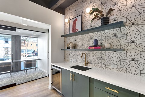 a kitchen with a sink and a window