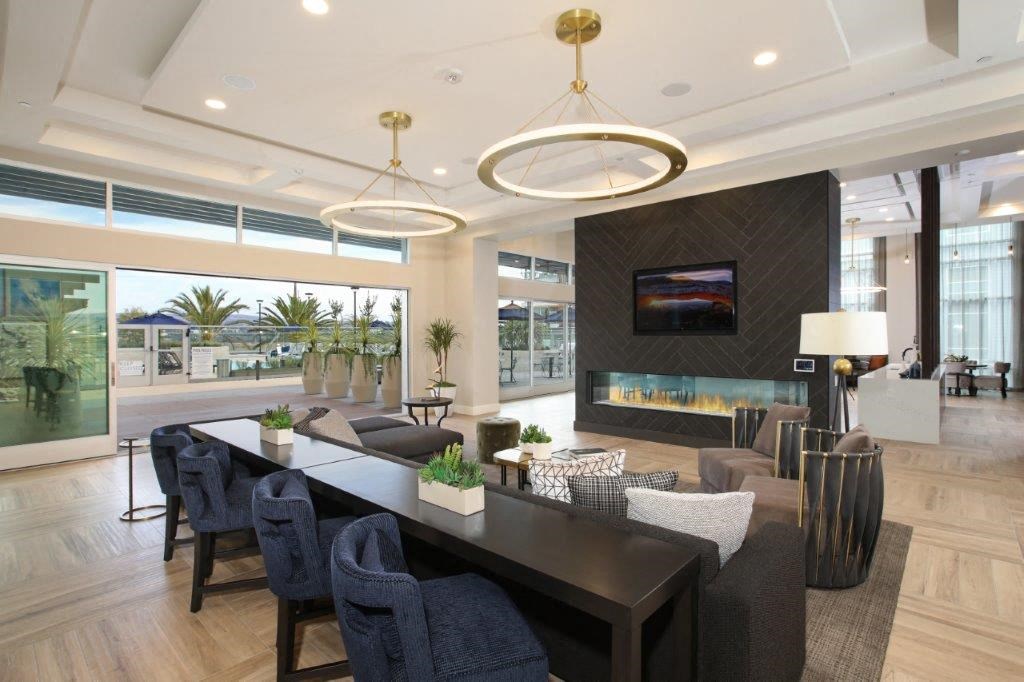 a dining room with a table and chairs and a fireplace