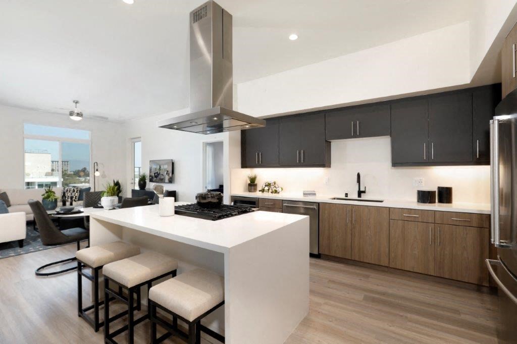 Modern kitchen with a large island and stools