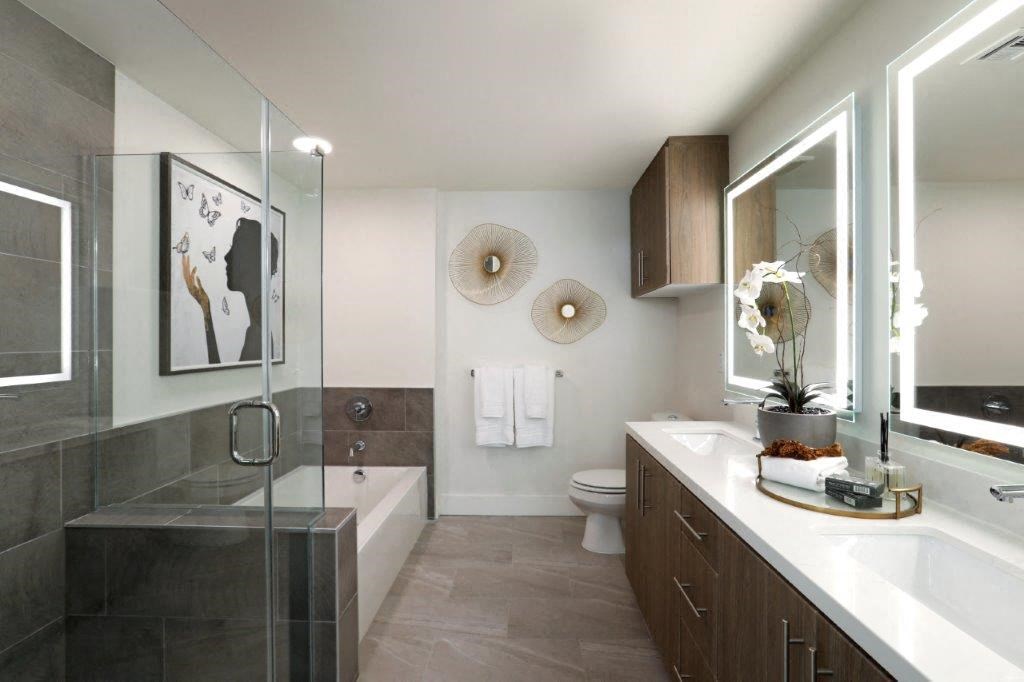 Bathroom with a sink, toilet, and shower