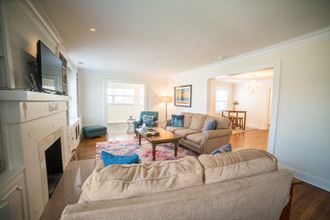 a living room with a couch and a tv