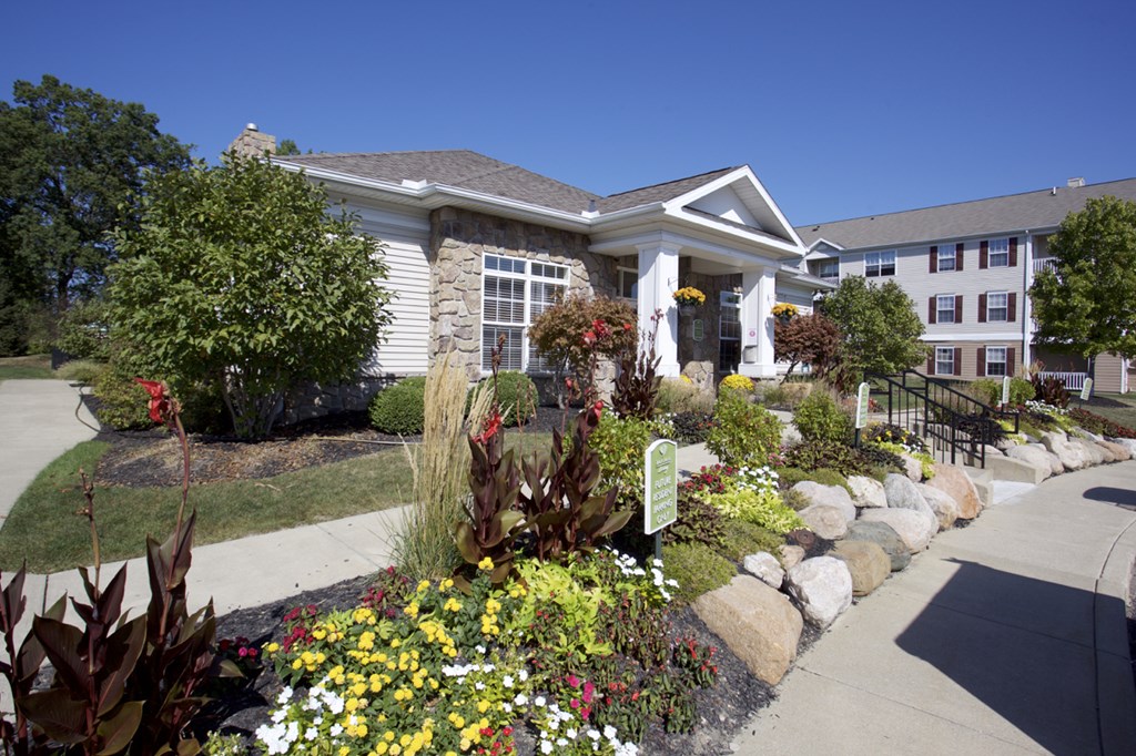 a house with a garden in front of it