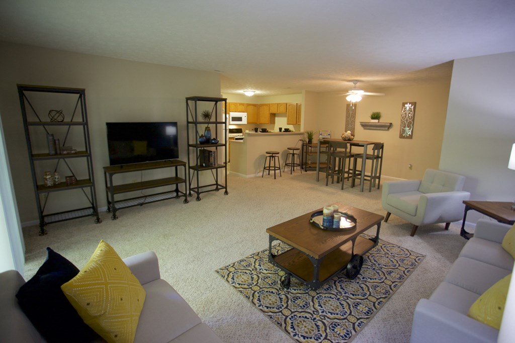 a living room with a couch and a table