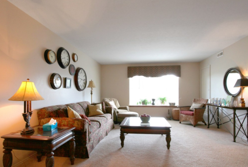 a living room with a couch and a table