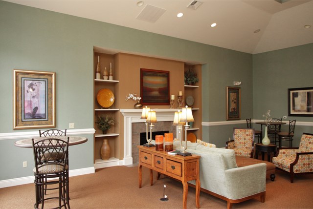 a living room with a couch and a table