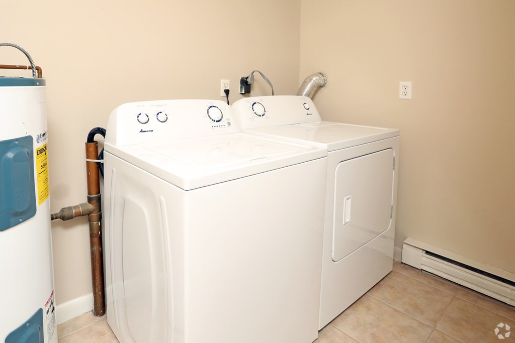 a washer and dryer in the laundry room of a home