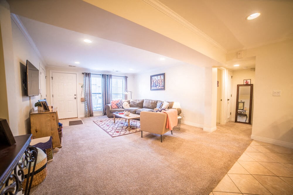 a living room with a couch and a tv