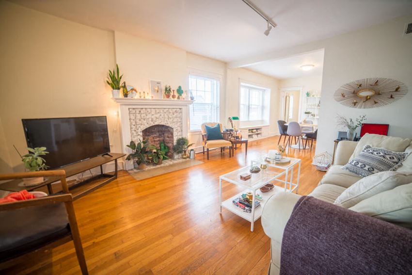 a living room with a couch and a fire place