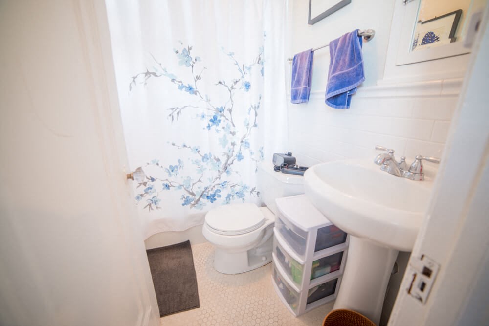 a bathroom with a toilet and a sink