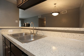 Granite Counter Tops In Kitchen Granite Counter Tops In Kitchen at Pleasant Creek Apartments, Lancaster, Texas - Photo Gallery 3